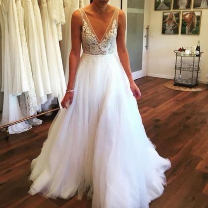 lace top and tulle skirt wedding dress