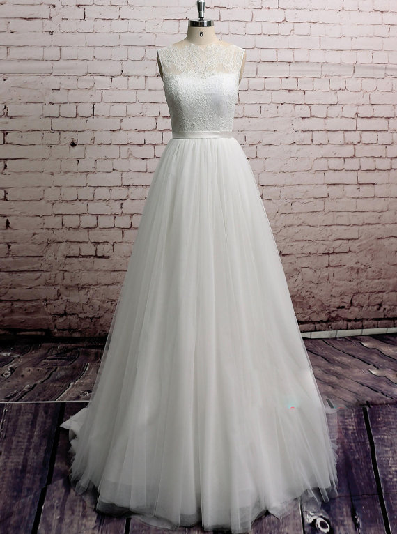 Sleeveless Illusion Lace Appliqués Tulle A-line Wedding Dress Featuring Sheer Back And Train